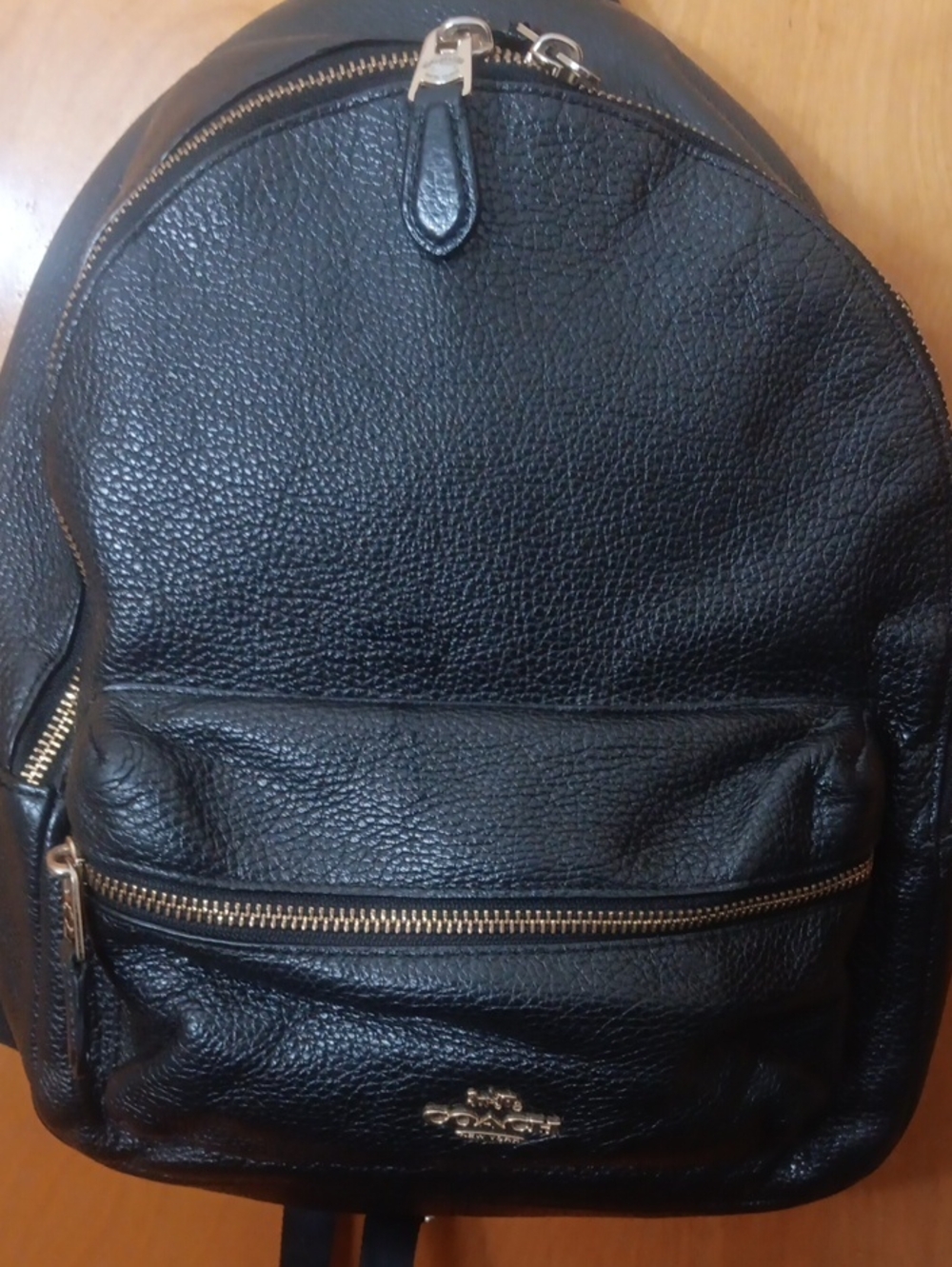 Black Leather Coach Backpack with Gold Hardware